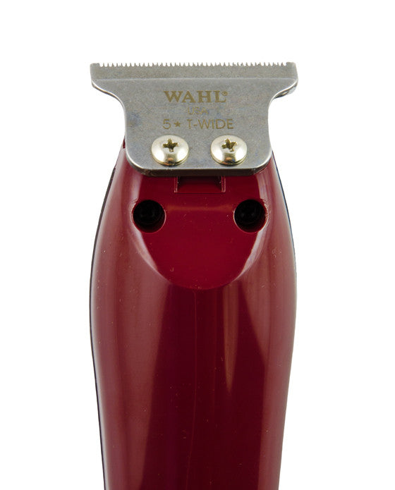 Are you looking for a lightweight, high precision detailer trimmer? Look no further, than the Wahl 5 Star. It is a corded operation with a powerful rotary motor trimmer and an adjustable T-wide blade. The extra-wide precision close-cutting blade is 1/4" wider and is fixed at "zero overlap" for the closest trim. Includes 3 T-shaped guides - 1/16" to 1/4". Kit Includes: Professional Trimmer 3 Trimming Guides (1/6" - 3/16" ) Oil Cleaning Brush Operating Instructions Red Blade Guard